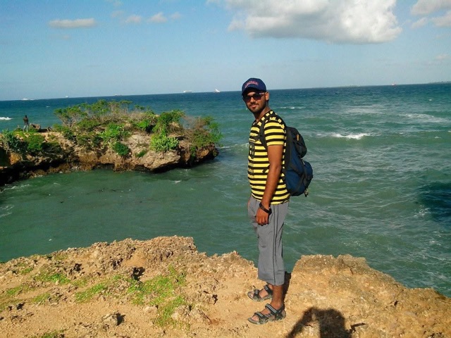 Standing on the rocks at the coast near Dar es Salaam